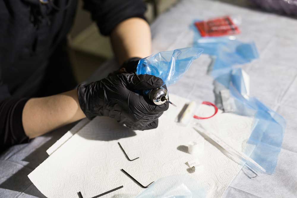 Vlogigurl The Tattoo Artist Takes the Proper Health and Safety Precautions